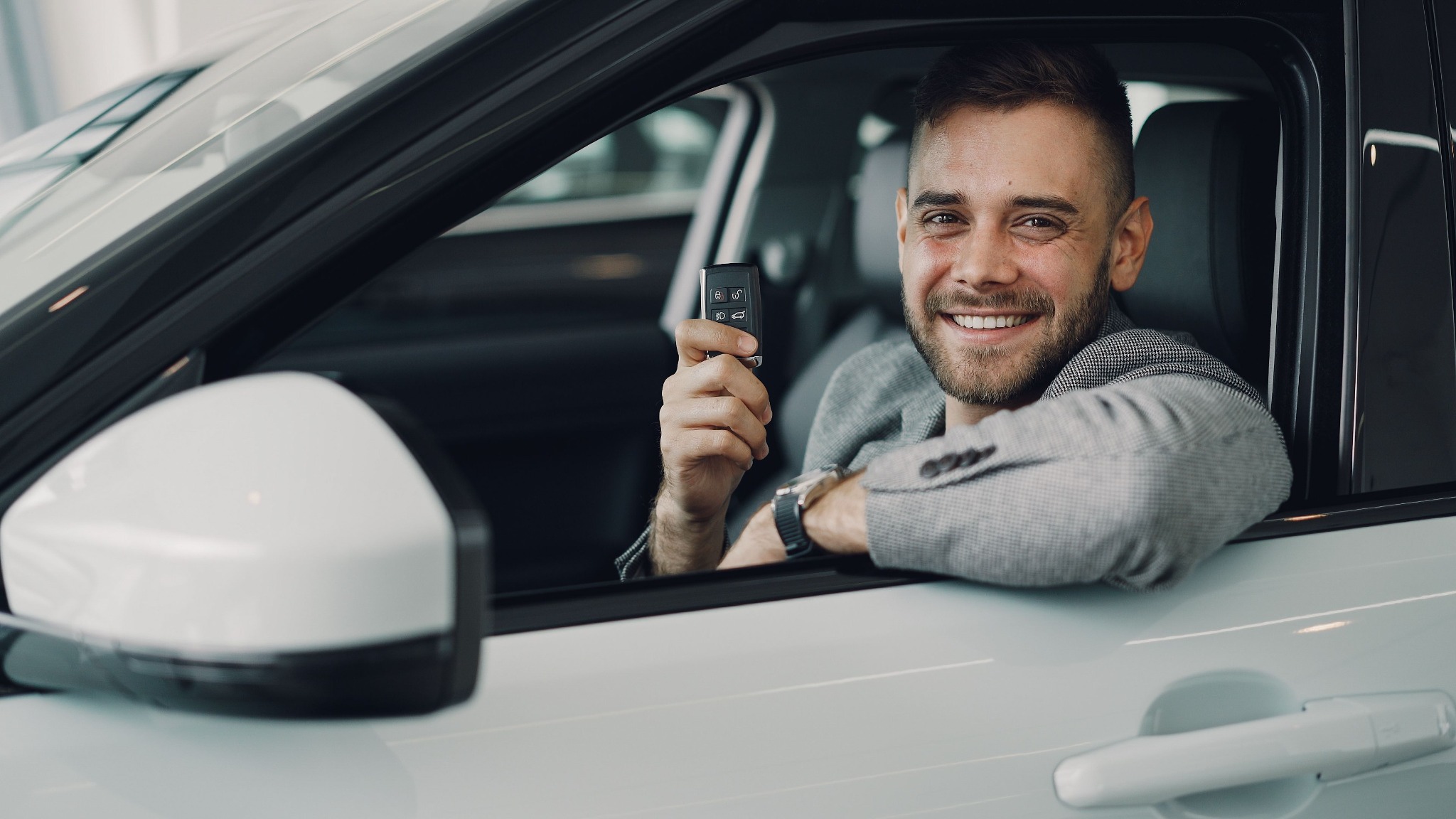 New vehicle owner with keys